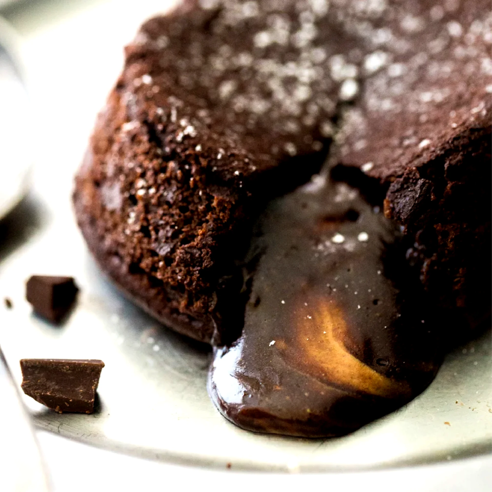 A warm chocolate dessert with melting ice cream